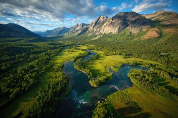 Aerial View Of Winding River Through Mountain Valley