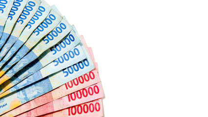 Indonesian Rupiah 50000 and 100000 Banknotes Fanned on White Background