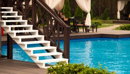 Outdoor pool with wooden stairs