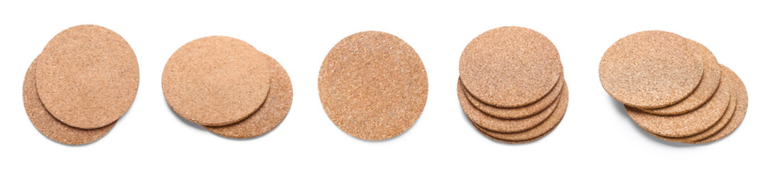 Set of cork drink coasters on white background