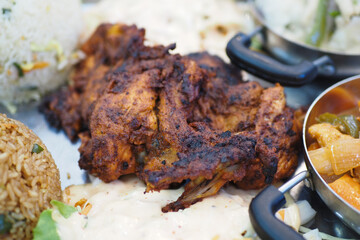 Delicious grilled chicken served with rice and vegetables