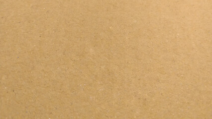 Vector cardboard realistic background. Texture of kraft paper. Brown color paper shown grain details on it's surface.