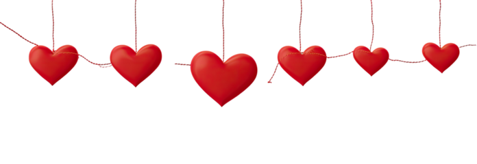 Red hearts hanging from strings against a black background