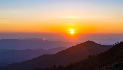 Obraz premium Sunrise over mountain ranges