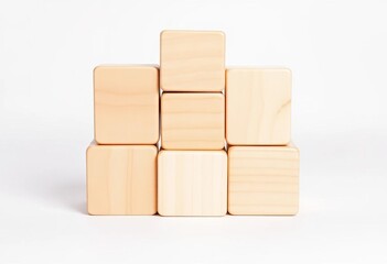 Six light wood cubes stacked in a pyramid formation on white background,   light color,  texture