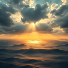 Fototapeta premium The sun shines through the clouds onto the sea.
