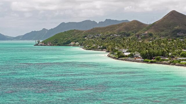 Oahu Island, Hawaii USA. Drone Shot of Turquoise Ocean Water, Beach and Green Coastline