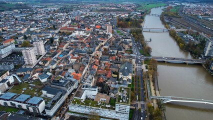 An aerial panorama view around the downtown of the City Thionville In France on a cloudy spring noon