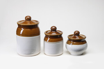 Indian old traditional storage Ceramic Pots for kitchen foods isolated on white background 