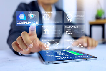 Compliance technology concept with businessman touch on virtual screen to apply standard and regulation to meet requirement of industrial standard and driven by AI technology