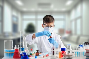 Little child make chemistry science experimental chemistry lessons.