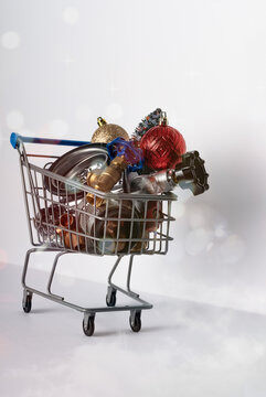 Christmas and New Year holiday composition featuring a shopping cart filled with plumbing tools,