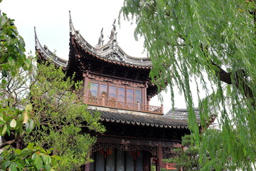 Yu Garden (Yuyuan), a garden built in 1577 with lots of pavilions, ponds, bridges and traditional buildings in Shanghai China 