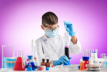 Little child make chemistry science experimental chemistry lessons.