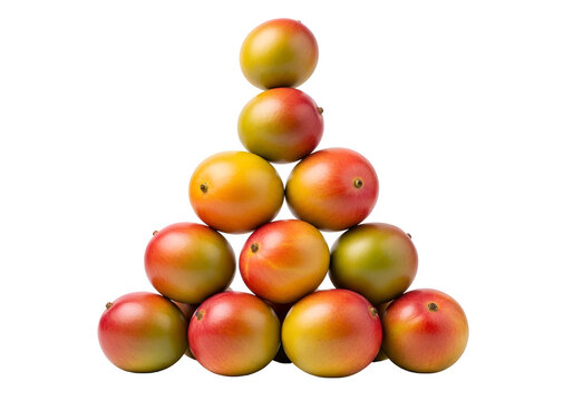 A vibrant arrangement of mangoes stacked in a triangular pyramid against a striking black backdrop.