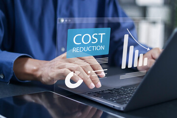 Cost reduction business finance concept. Costs cut, and costs optimization business. Businessman using laptop with cost reduction icon for budget management and cost management.