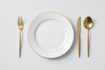 White plate with gold rim centered, two gold forks on left, gold knife and spoon on right, minimalist table setting on light gray background