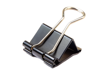 Close up studio shot of a black binder clip isolated on a pure black surface for office supplies transparent background