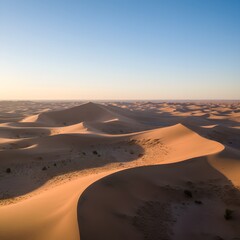 Aerial drone shot of a desert landscape with sand dunes
