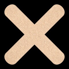 Two beige bandages crossed in an X shape on a black background.