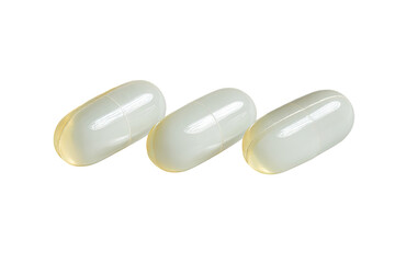 Three translucent pale-yellowish capsules, slightly oval-shaped, in a horizontal row