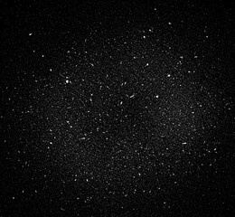 Obraz premium Abstract black and white grunge texture with scratches, dust, noise, and glitter particles on dark background, distressed vintage style, high resolution 