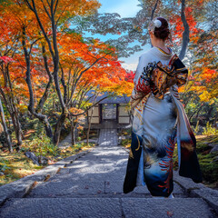 Japanese Woman in Traditional Kimono Dress at Jojakkoji Temple with beautiful foliage in autumn in...