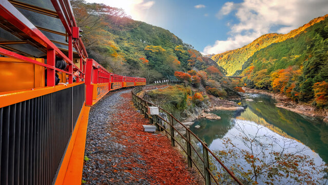 Kyoto, Japan - November 21 2024: Sagano Romantic Train with beautiful foliage in autumn in Kyoto, Japan