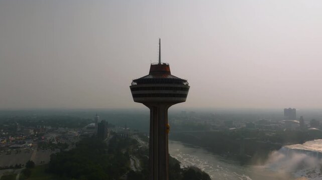 Aerial drone view of Skylon Tower and Niagara Falls skyline in Ontario, Canada