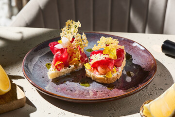 Gravlax salmon bruschetta with parmesan crisp, bright natural light, angled plate composition