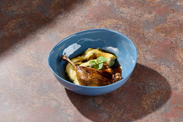 Duck leg with creamy celery root puree, bright lighting, overhead composition