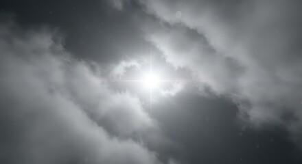 Obraz premium A dramatic grayscale sky filled with dense clouds, revealing a bright, central sunbeam.