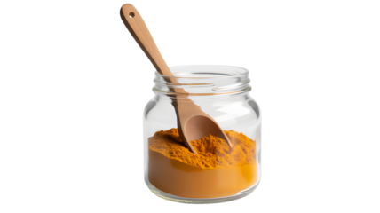 Bright orange turmeric powder fills glass jar with wooden scoop ready for culinary use