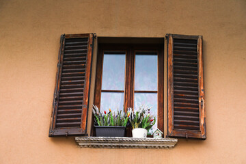 the window of the old yellow house