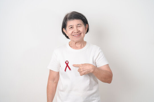 Elderly with Burgundy Ribbon for March Multiple Myeloma Cancer Awareness month, September Sickle Cell Anemia, Headache and Migraine week, April world Meningitis day, October Hospice Palliative care - Powered by Adobe