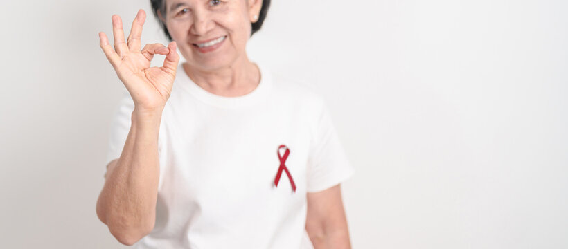 Elderly with Burgundy Ribbon for March Multiple Myeloma Cancer Awareness month, September Sickle Cell Anemia, Headache and Migraine week, April world Meningitis day, October Hospice  Palliative care