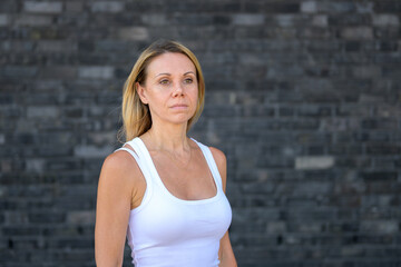 Confident Woman In White Top