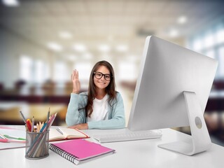 Young girl student learning on computer
