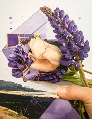 A vibrant composition featuring a delicate bouquet of lupines and a cream-colored rose, nestled within a geometric, amethyst-toned structure.