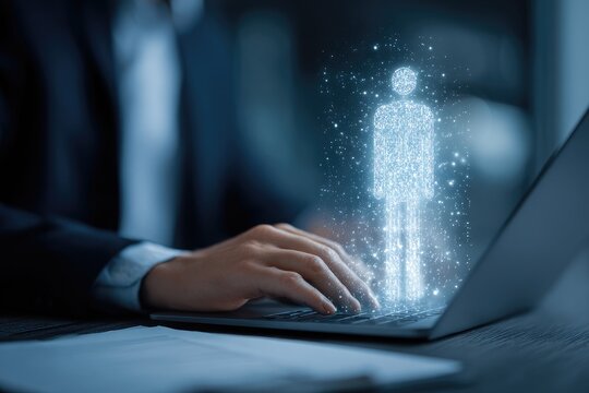 Close-up of person working on laptop, holographic figure