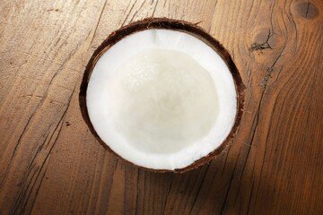 Fresh cracked or cut coconut on desk