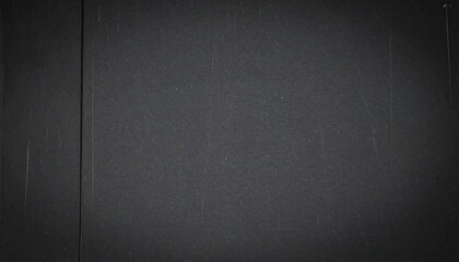 黒いテクスチャ背景　微細な傷や質感が浮かぶシンプルなブラックサーフェス