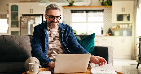 Obraz na płótnie Canvas Happy, freelancer and man with laptop, home and financial analyst with positive feedback on website. Remote work, account manager or mature person with tech for data analysis and info on documents