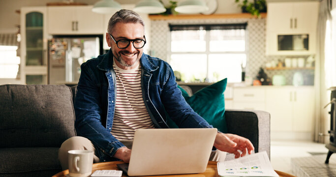 Happy, freelancer and man with laptop, home and financial analyst with positive feedback on website. Remote work, account manager or mature person with tech for data analysis and info on documents - Powered by Adobe