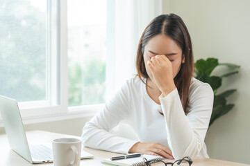 Eye problem concept, fatigue asian young woman tired eyes, irritated rubbing nose, relief vision...