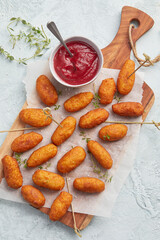 Beetroot croquettes with BBQ tomato sauce