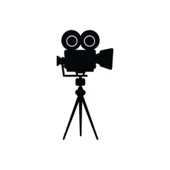 Black Silhouette of an Old- Fashioned Movie Camera on a Tripod film camera video with Vector Design