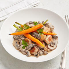 Parsnip gnocchi with morel mushroom sauce