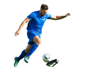 young man jumping with soccer ball