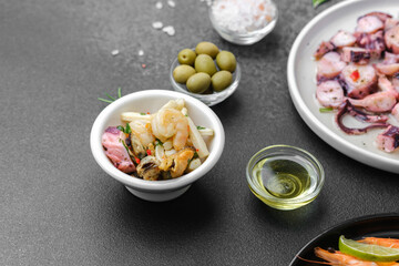 Shrimp and vegetables mix in black bowl for Asian seafood or healthy cuisine concept
